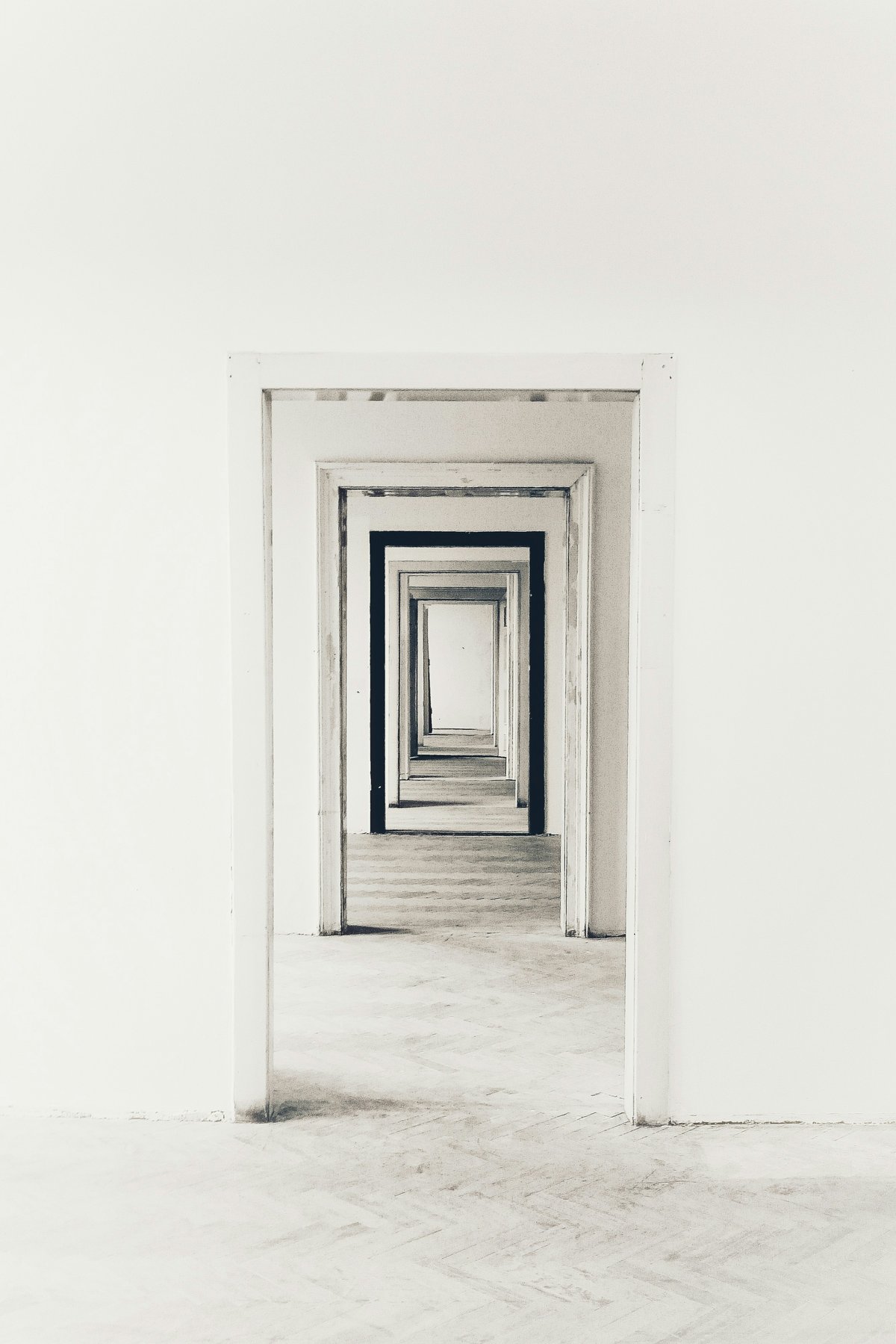 A sequence of doorways receding into the distance